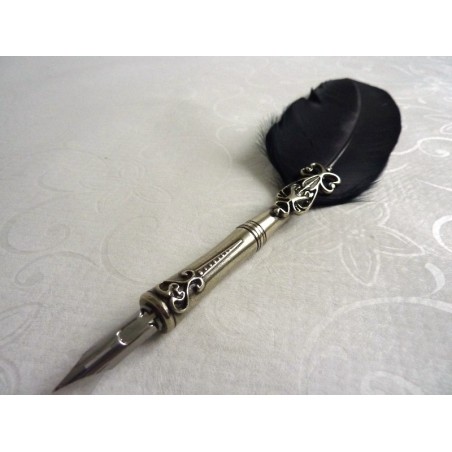 Sulka kynä, mustepullo ja kynäteline