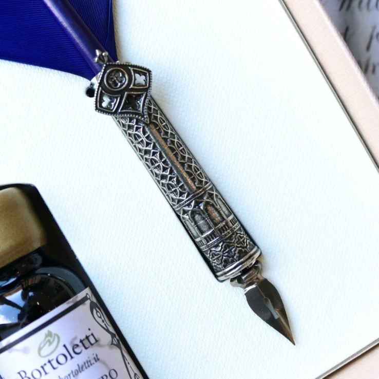 Ornate Feather quill pen and ink